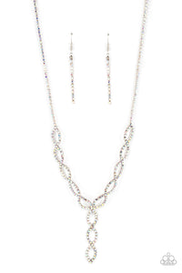 Gorgeous necklace featuring iridescent rhinestones in infinity shapes.  A braided array of iridescent gems intertwine and cascade in a stunning Y design along the neckline. Features an adjustable clasp closure.